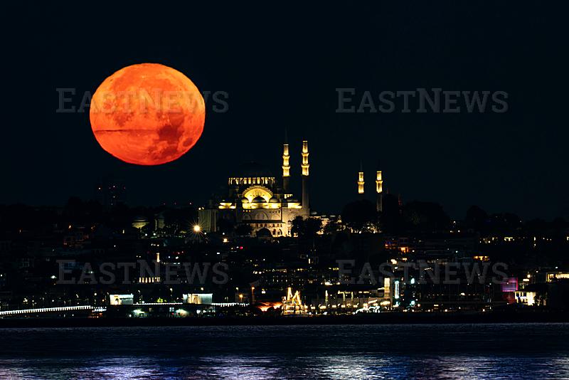Buck Moon Sets Behind the Suleymaniye Mosque in Istanbul