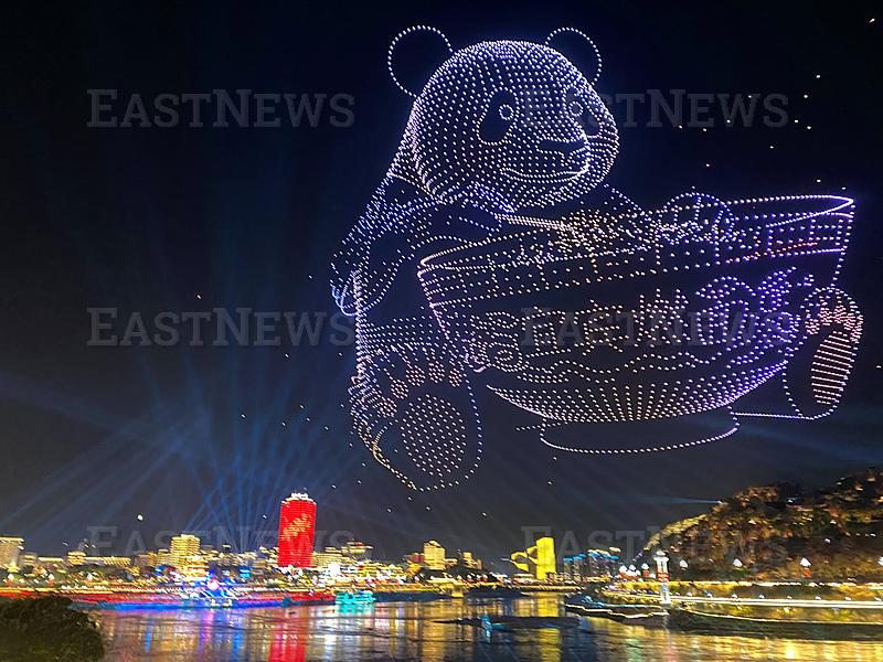 YIBIN, CHINA - FEBRUARY 11: Drones form a giant panda-shaped pattern in the sky during a light show as the Spring Festiv