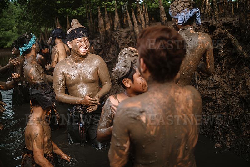Mebuug-Buugan Tradition, Mud War On The Island Of Bali, Indonesia.