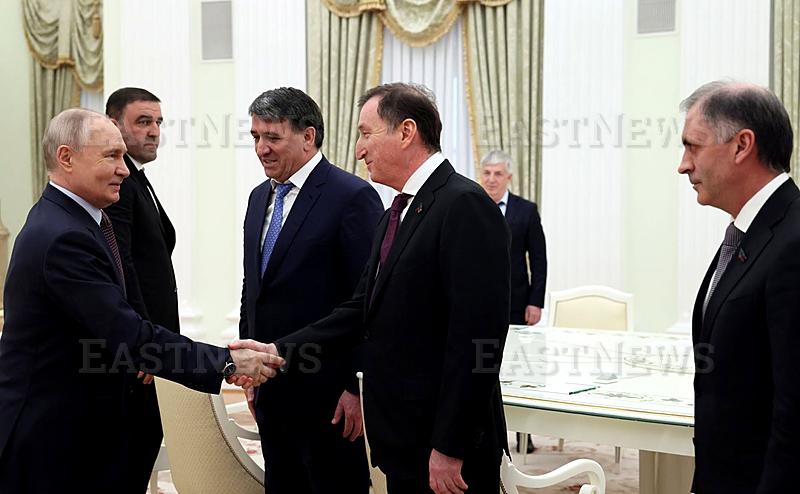 Russian President Vladimir Putin holds a meeting with representatives